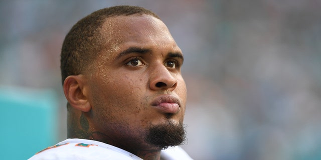 Mike Pouncey of the Miami Dolphins on the sideline during a game against the New York Jets at Hard Rock Stadium on October 22, 2017 in Miami Gardens, Florida.