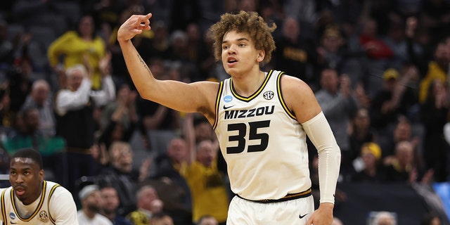 Noah Carter #35 of the Missouri Tigers celebrates a basket in the first half against the Utah State Aggies during the first round of the 2023 NCAA Men's Basketball Tournament held at Golden 1 Center on March 16, 2023 in Sacramento, California.