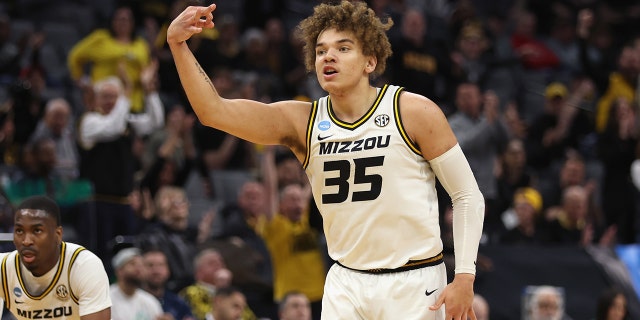 Noah Carter #35 of the Missouri Tigers celebrates a basket in the first half against the Utah State Aggies during the first round of the 2023 NCAA Men's Basketball Tournament held at Golden 1 Center on March 16, 2023 in Sacramento, California.