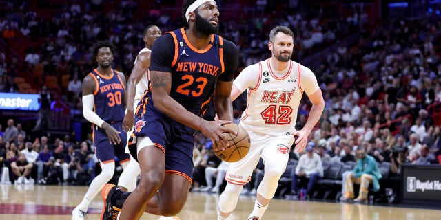 Mitchell Robinson of the New York Knicks drives to the basket against the Miami Heat during the first quarter of the game at Miami-Dade Arena in Miami on Wednesday.