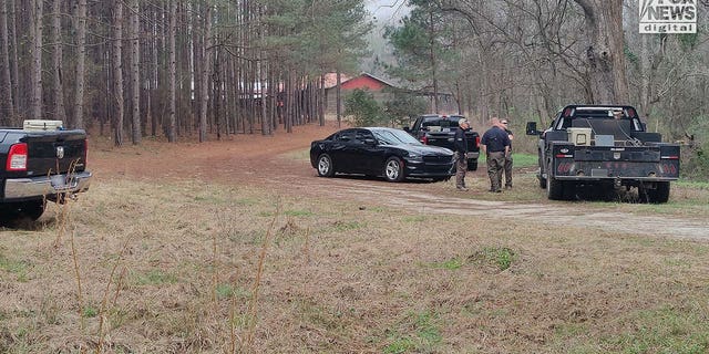 Police officers secure Moselle, Alex Murdaugh’s former estate where the double murders took place, prior to the jury’s visit on in Walterboro, South Carolina on Wednesday, March 1, 2023.