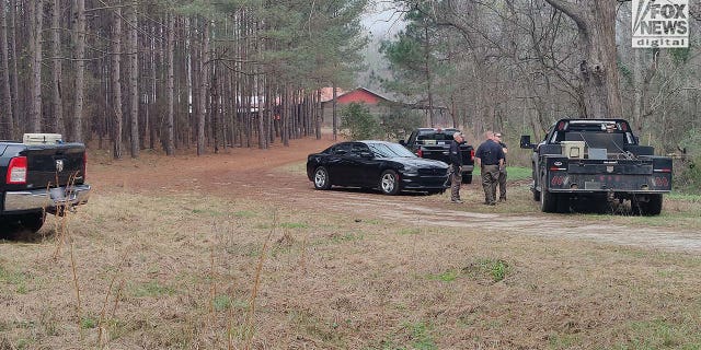 Police officers secure Moselle, Alex Murdaugh’s former estate where the double murders took place, prior to the jury’s visit on in Walterboro, South Carolina on Wednesday, March 1, 2023.