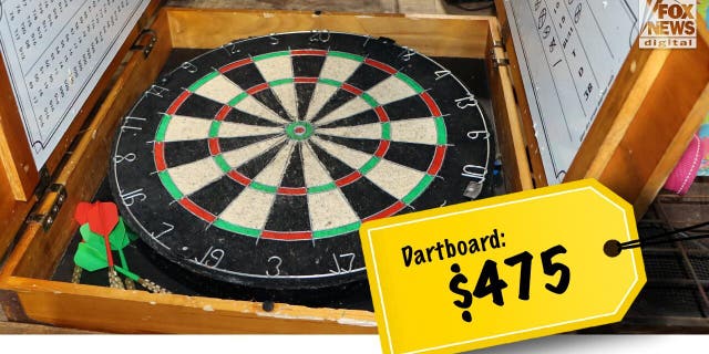 A dart board with Buster Murdaugh's name written on a scoreboard sold for $475.