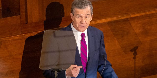 North Carolina Gov. Roy Cooper delivers his State of the State address to a joint session of the North Carolina General Assembly on March 6, 2023, in Raleigh, N.C.