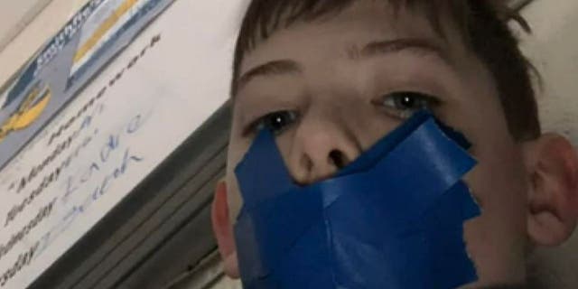 Brady Webster sent his mother a photo from his sixth grade classroom showing his mouth taped shut.