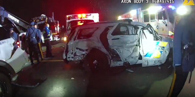 The two New Jersey State Police vehicles hit by the truck are seen following the accident.
