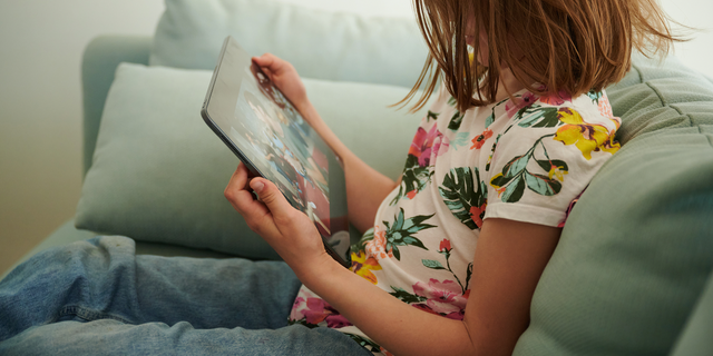 Child watching tablet