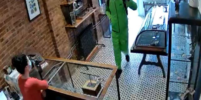 A Brooklyn jewelry store owner says she's been robbed at knifepoint twice by the same crook since February