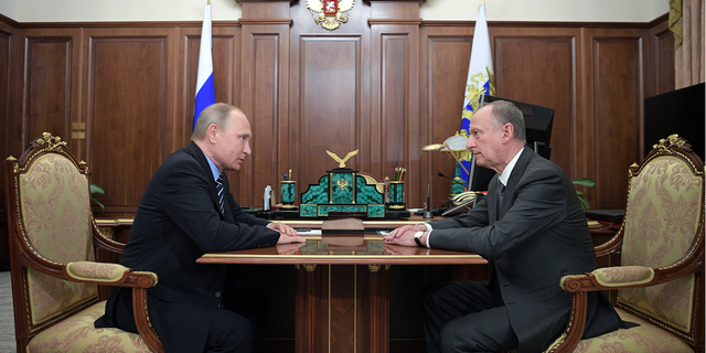 Russian President Vladimir Putin, left, meets with Security Council Secretary Nikolai Patrushev in Moscow June 2017. Patrushev is a close ally of Putin, according to Reuters.