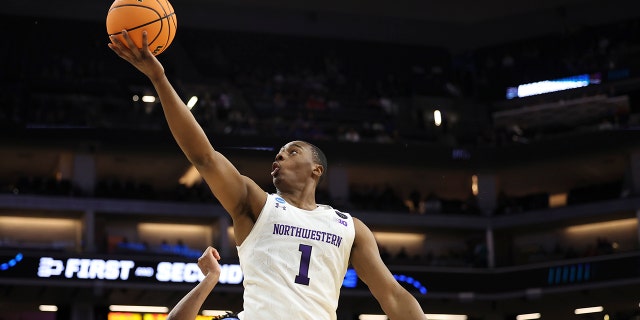 Chase Audige #1 of the Northwestern Wildcats shoots a layup against the Boise State Broncos during the first half in the first round of the NCAA Men's Basketball Tournament at Golden 1 Center on March 16, 2023 in Sacramento, California.