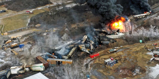 This photo taken with a drone shows portions of a Norfolk Southern freight train that derailed Feb. 3, in East Palestine, Ohio, still on fire Feb. 4, 2023.