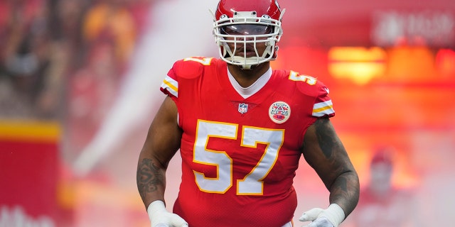 Orlando Brown Jr. #57 of the Kansas City Chiefs runs onto the field during introductions against the Jacksonville Jaguars at GEHA Field at Arrowhead Stadium on January 21, 2023 in Kansas City, Missouri.