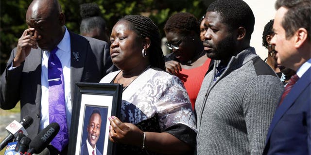 Virginia family of man who died at state mental hospital says civil rights were violated: report 2 Caroline Ouko, mother of Irvo Otieno, holds a portrait of her son with attorney Ben Crump, left, her older son, Leon Ochieng and attorney Mark Krudys at the Dinwiddie Courthouse in Dinwiddie, Va., on Thursday, March 16, 2023. There is goodness in his music and that's all I'm left with now — he's gone," Otieno's mother, Caroline Ouko, said at the news conference while clutching a framed photo of her son.