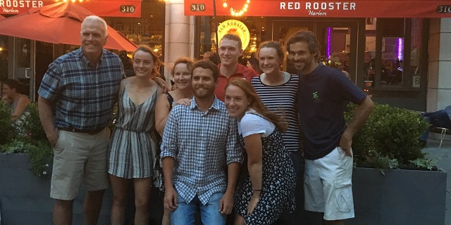 The Prial family is shown here, including all five children. Mom Anne Leavy-Prial is third from left; her husband, Greg Prial, is at far left. Their son, Danny Prial, is at center, rear, in red shirt.