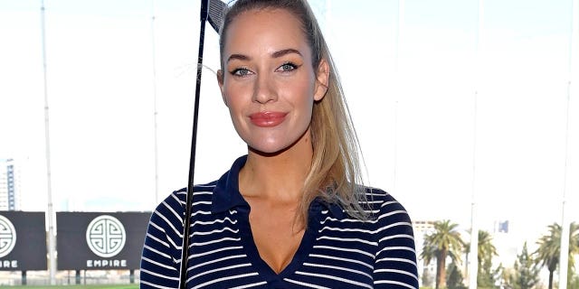 Paige Spiranac attends ACM Lifting Lives Topgolf Tee-Off &amp; Rock On at Topgolf Las Vegas on March 6, 2022. 