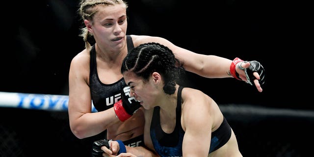Paige VanZant, left, fights against Rachael Ostovich during their Women's Flyweight fight at UFC Fight Night at Barclays Center on Jan. 19, 2019 in New York City.