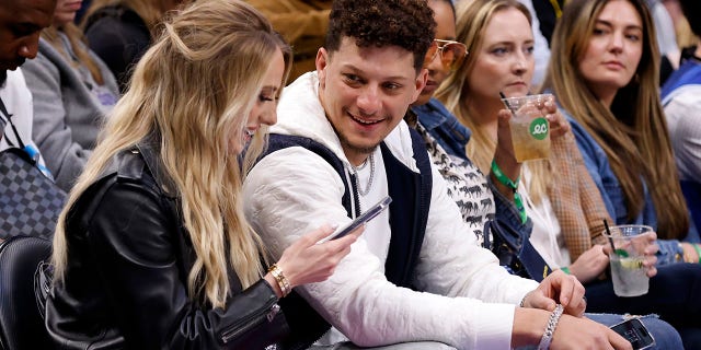 Kansas City Chiefs quarterback Patrick Mahomes and wife Brittany Mahomes sit courtside during a game between the Dallas Mavericks and the Los Angeles Lakers at the American Airlines Center Feb. 26, 2023, in Dallas, Texas.