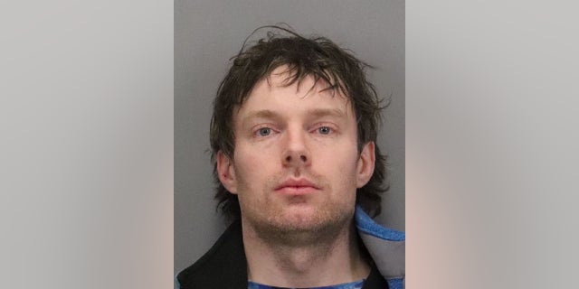 Pete Karasev, 35, is charged in connection with a police investigation into suspected explosives and illegal drug offenses, authorities said.