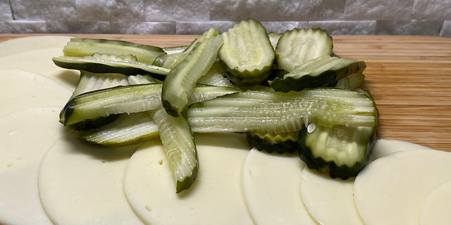 Odd ‘pickles-in-a-blanket’ snack is TikTok’s viral food trend after user shares the ‘guilty pleasure’