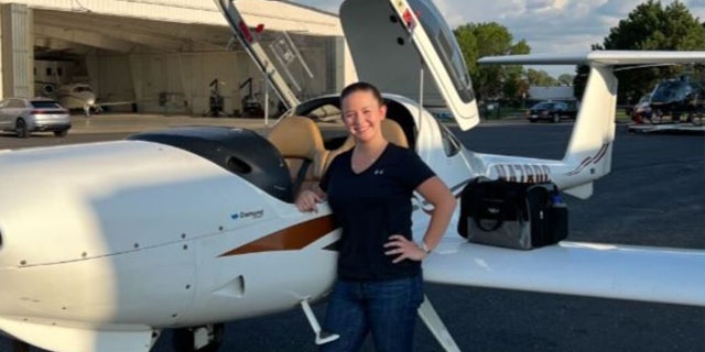 The young pilot is standing in front of an airplane, confident that this is what it is "supposed to do," Despite the stressful landing.