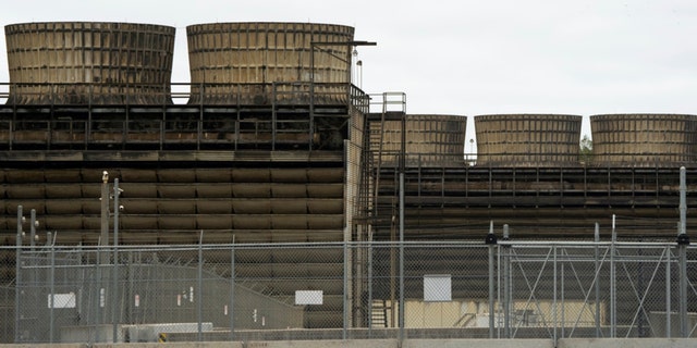 Cooling towers release heat generated by boiling water reactors at Xcel Energy's Nuclear Generating Plant on Oct. 2, 2019, in Monticello, Minnesota.