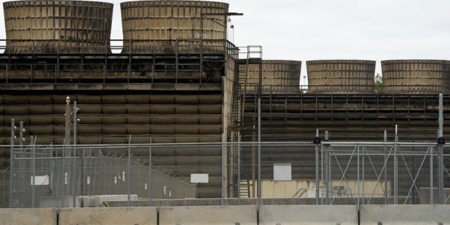 Cooling towers release heat generated by boiling water reactors at Xcel Energy's Nuclear Generating Plant on Oct. 2, 2019, in Monticello, Minnesota.