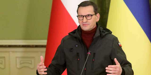 Prime Minister of the Republic of Poland Mateusz Morawiecki attends a briefing in Kyiv, Ukraine. An investigation into the hacked email mailbox of an aide to Morawiecki has been opened. The aide resigned last year.