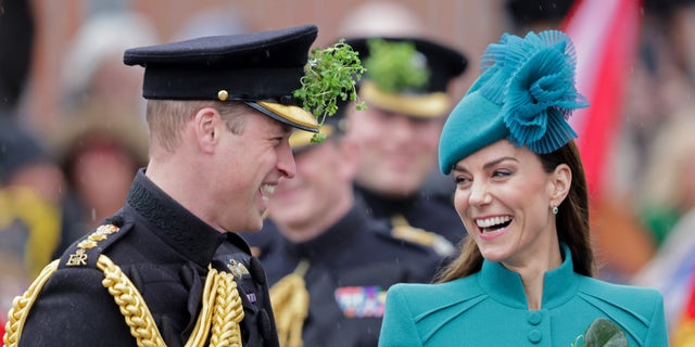 Prince William, left, and Kate Middleton attend a St. Patrick's Day Parade.