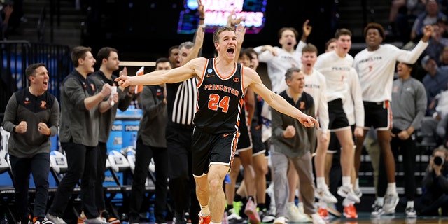 Blake Peters #24 of the Princeton Tigers celebrates a three point basket against the Arizona Wildcats during the second half in the first round of the NCAA Men's Basketball Tournament at Golden 1 Center on March 16, 2023 in Sacramento, California.