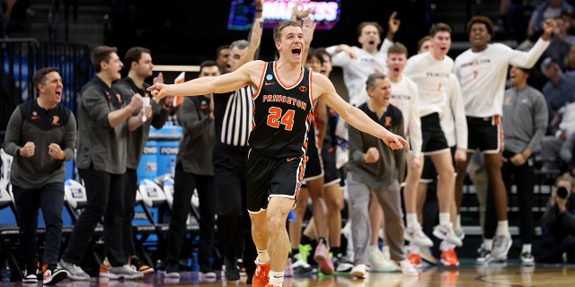 No. 24 Blake Peters of the Princeton Tigers celebrates a three-point shot against the Arizona Wildcats in the second half of the first round of the NCAA Men's Basketball Tournament at the Golden 1 Center on March 16, 2023 in Sacramento, California.