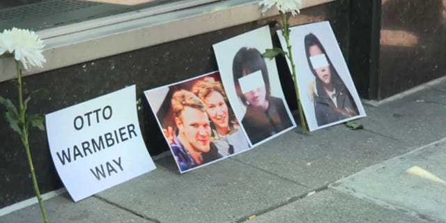 A photo showing Otto Warmbier and North Korean victims of the Kim regime outside the North Korean U.N. mission in New York.