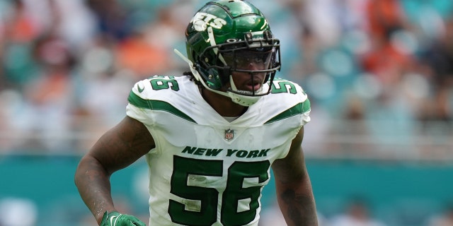 New York Jets linebacker Quincy Williams (56) steps sideways at the line of scrimmage to follow play during a game between the New York Jets and the Miami Dolphins on Sunday, January 8, 2023 at Hard Stadium -Rock, Miami Gardens, Florida.