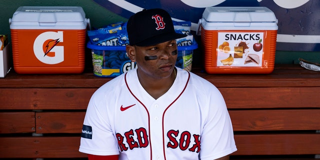 Rafael Devers #11 of the Boston Red Sox reacts before a Spring Training Grapefruit League game against the Tampa Bay Rays on February 26, 2023 at jetBlue Park on Fenway South in Fort Myers, Florida.