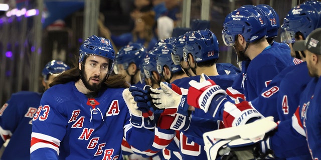 Mika Zibanejad #93 of the New York Rangers scores at 4:09 of the first period against the Washington Capitals at Madison Square Garden on March 14, 2023 in New York City.