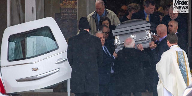Loved ones of Rebecca Bliefnick attend her funeral at St. Peter Church in Quincy, Illinois on Friday, March 3, 2023. Rebecca Bliefnick was found shot to death in her home in February.
