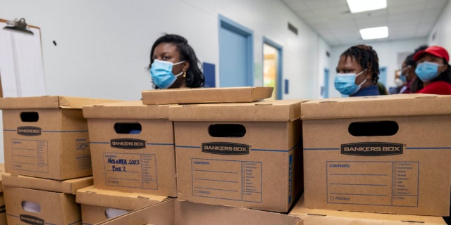 Boxes filled with recall petitions for New Orleans Mayor LaToya Cantrell are delivered to City Hall by nolatoya.org organizers and volunteers on Feb. 22, 2023, in New Orleans. 