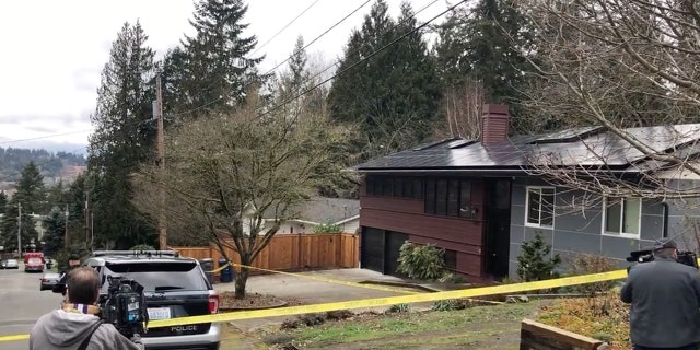 Medical examiners arrived Friday morning, hours after a stalking suspect shot and killed a podcast host and her husband before killing himself. 