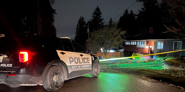Redmond police say they arrived on scene around 2 a.m. Friday and attempted CPR on a man with gunshot wounds. Inside, they found a woman and the suspect, also deceased.