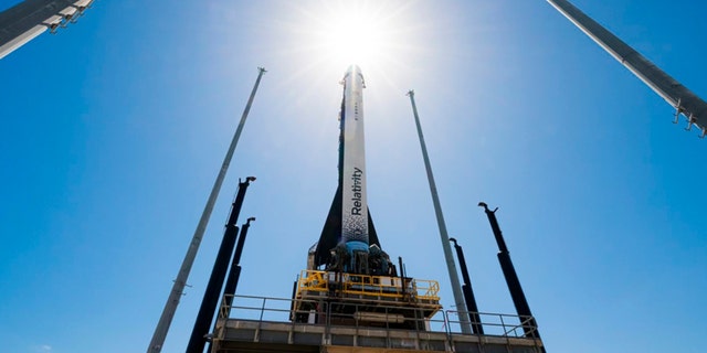 In this photo provided by Relativity Space, the company's Terran 1 rocket sits on a launch pad in Cape Canaveral, Fla., on Wednesday, March 22, 2023. 