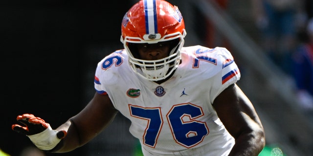 Florida Gators offensive lineman Richard Gouraige (76) prepares to pass block during the football game between the Florida Gators and Texas A&amp;M Aggies at Kyle Field on November 5, 2022 in College Station, Texas.