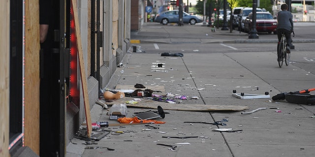 Debris lies on the sidewalk along Tucker Avenue from businesses that sustained damage from overnight protests on June 2, 2020 in St Louis, Missouri.