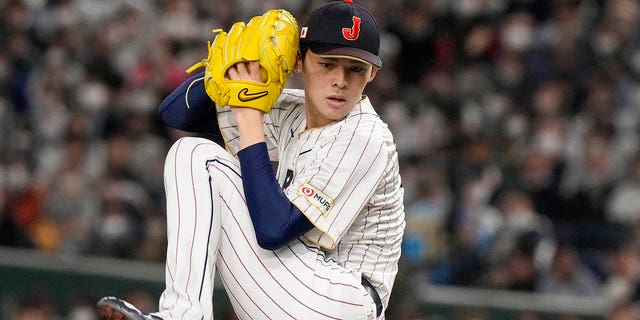 Roki Sasaki of Japan pitches during their Pool B game against the Czech Republic at the World Baseball Classic at the Tokyo Dome, Japan, Saturday, March 11, 2023. 