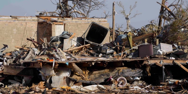 Piles of debris, insulation, damaged vehicles and home furnishings are all that remain of was a mobile home park in Rolling Fork, Miss., Saturday, March 25, 2023.