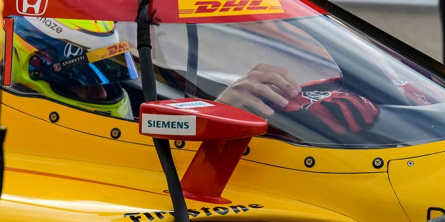 Romain Grosjean, the pole sitter, sits in his car before warmup laps for the Grand Prix of St. Petersburg, Sunday, March 5, 2023, in Florida.