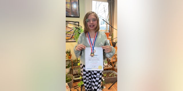 Ruby Labuschewsky has been awarded "The Largest Foot in the Girls 7-9-year-old Category" for her 10.5 shoe size.