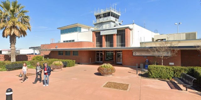 The entrance to Sacramento Executive Airport. A suspected thief crashed a helicopter on the tarmac while trying to break into other choppers as well, police said.