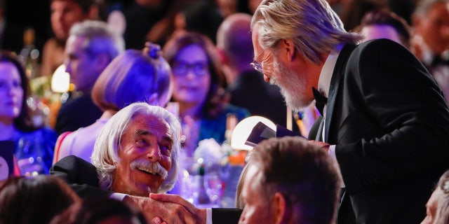 Former "The Big Lebowski" stars Jeff Bridges and Sam Elliott reunited at the 2023 SAG Awards.