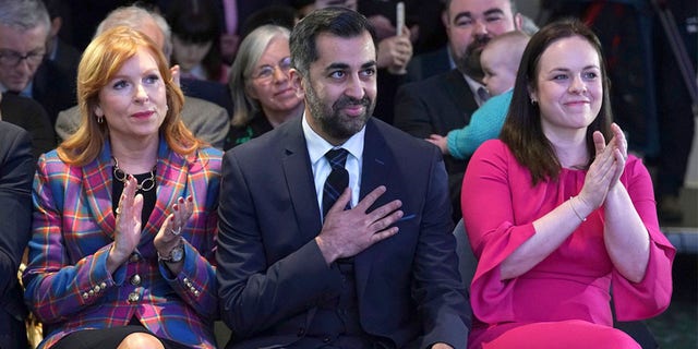 Scottish National Party leader candidates Ash Regan, left, and Kate Forbes applaud as Humza Yousaf, center is announced new SNP leader, at Murrayfield Stadium, in Edinburgh, Scotland, Monday, March 27, 2023.
