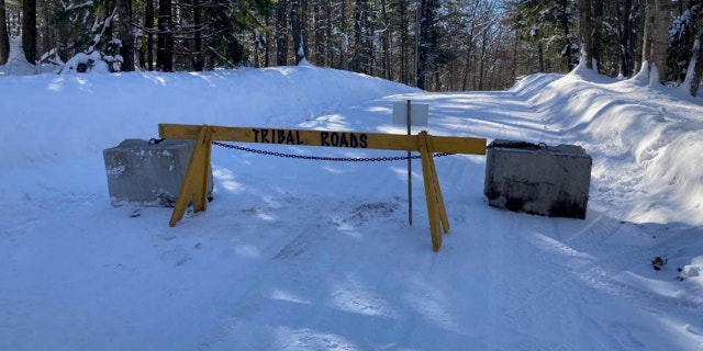 A tribal barricade is pictured on Elsie Lake Lane in Lac du Flambeau, Wisconsin.