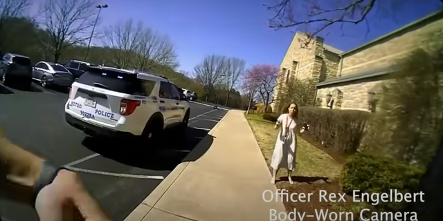 A teacher met the first officer outside the school and immediately started briefing him on the situation inside.